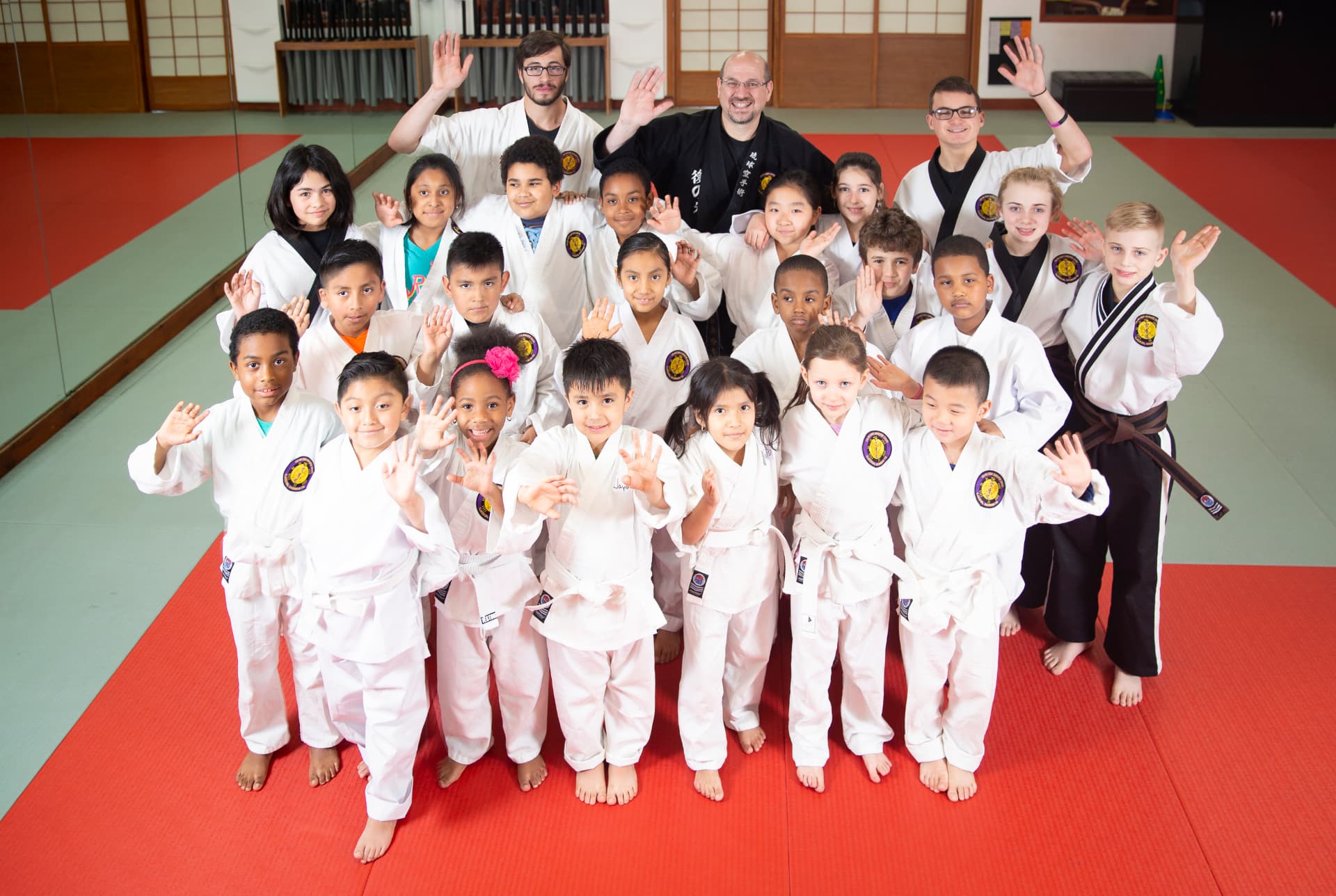 Students of all ages lined up together after class at Go No Sen Karate in Peekskill